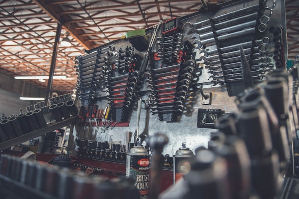 Auto repair technician working in a service bay